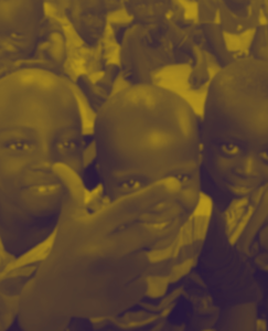 A group of children with beaming smiles in Burundi, with a yellow color overlay